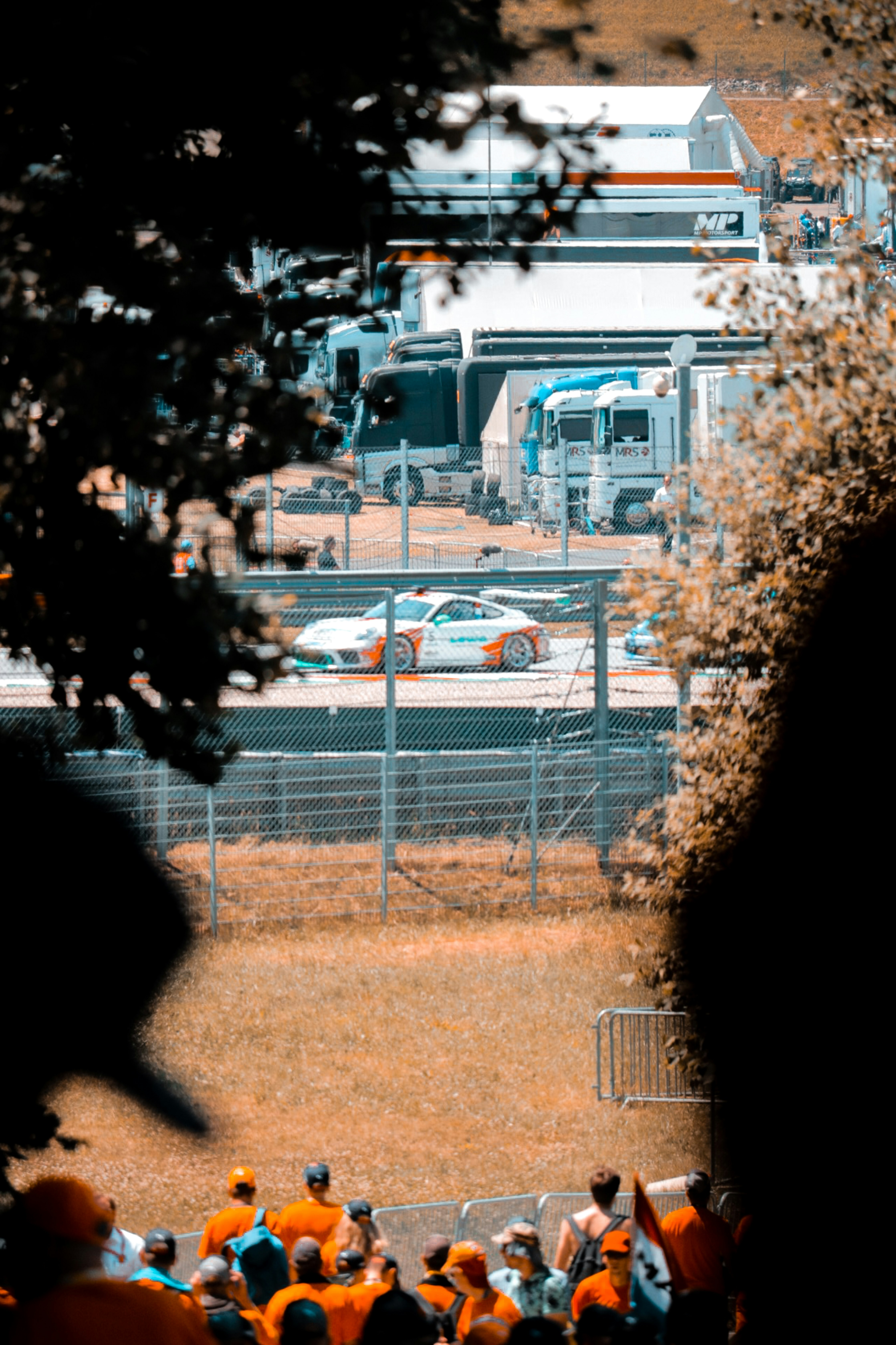 people gathering near race track